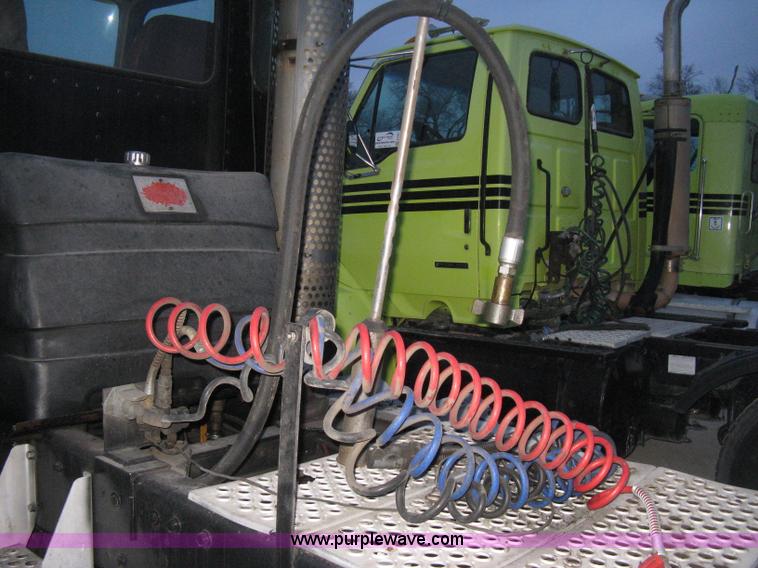 image for item E3302 1998 Kenworth T802SH semi truck