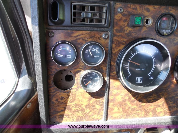 image for item E3302 1998 Kenworth T802SH semi truck