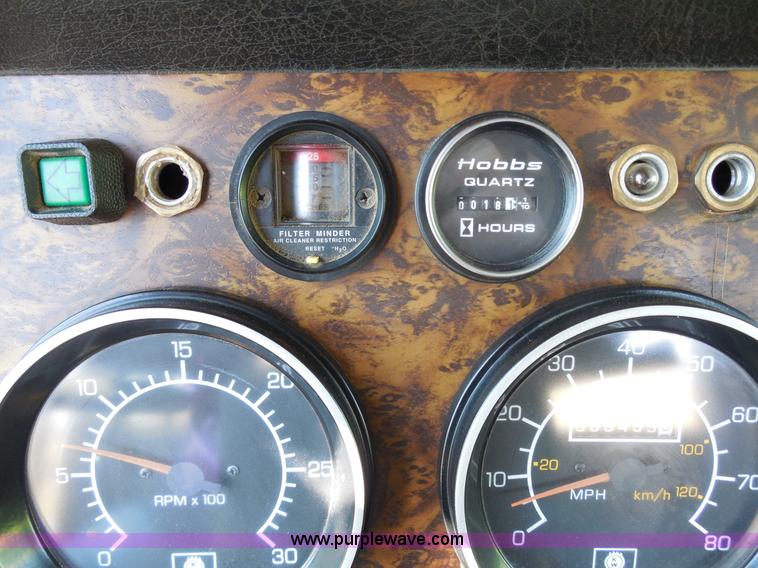 image for item E3302 1998 Kenworth T802SH semi truck