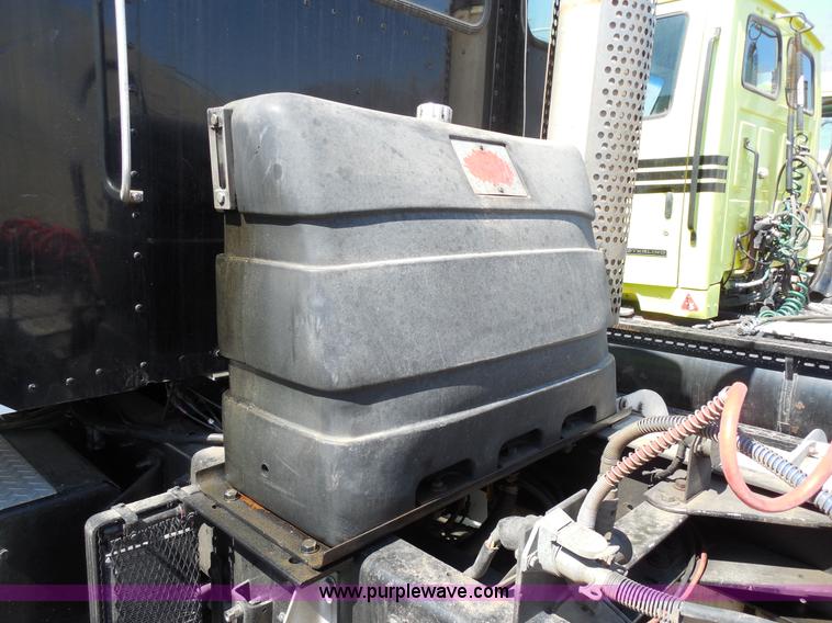 image for item E3302 1998 Kenworth T802SH semi truck