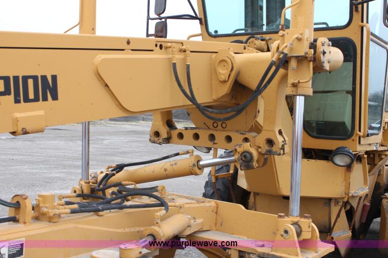 image for item E4315 Champion 720A Series IV articulated motor grader