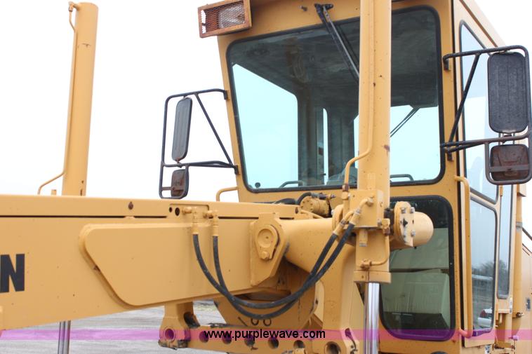 image for item E4315 Champion 720A Series IV articulated motor grader