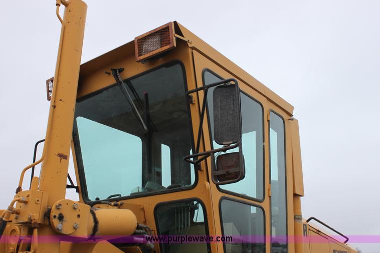 image for item E4315 Champion 720A Series IV articulated motor grader