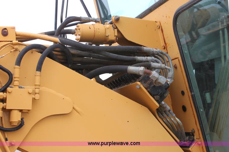 image for item E4315 Champion 720A Series IV articulated motor grader