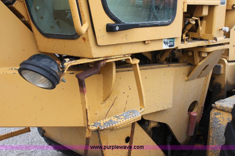 image for item E4315 Champion 720A Series IV articulated motor grader