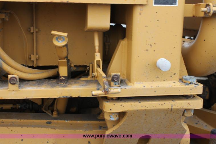 image for item E4315 Champion 720A Series IV articulated motor grader