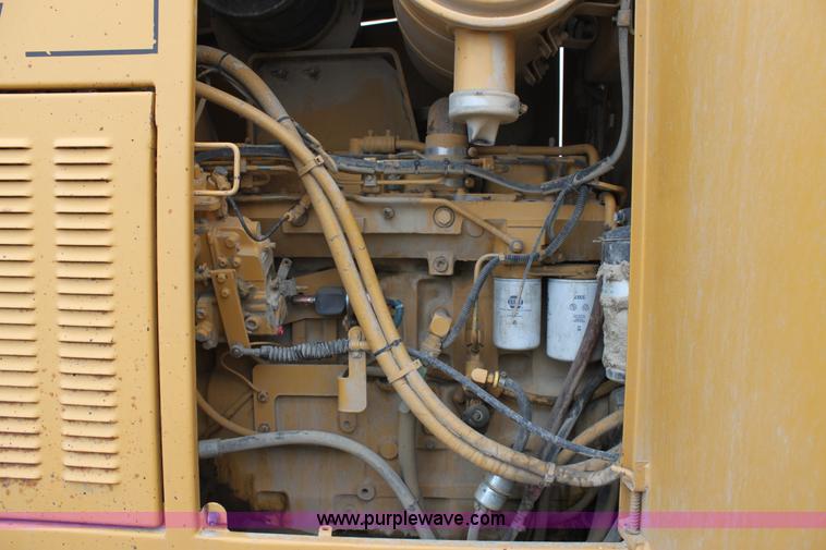 image for item E4315 Champion 720A Series IV articulated motor grader