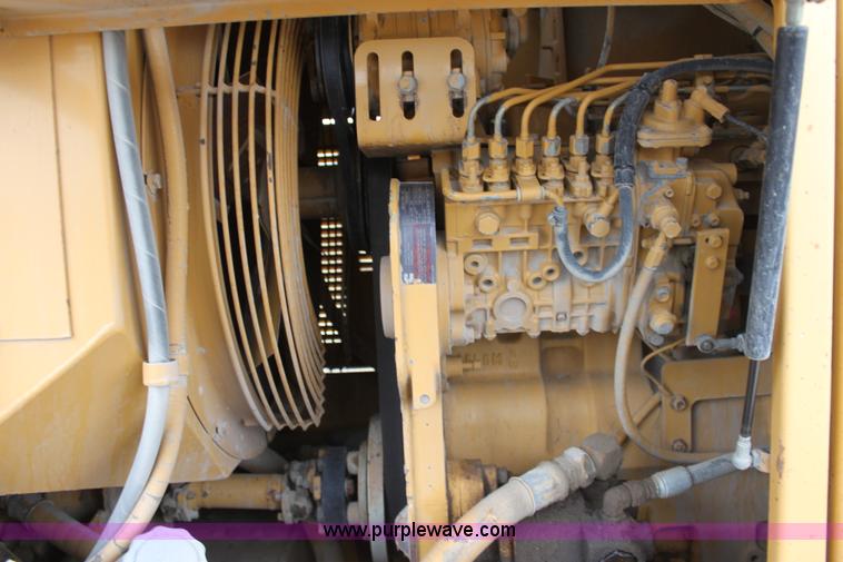 image for item E4315 Champion 720A Series IV articulated motor grader