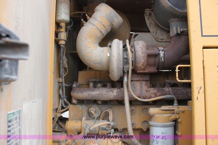 image for item E4315 Champion 720A Series IV articulated motor grader