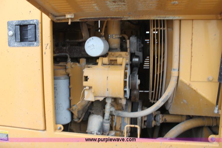 image for item E4315 Champion 720A Series IV articulated motor grader