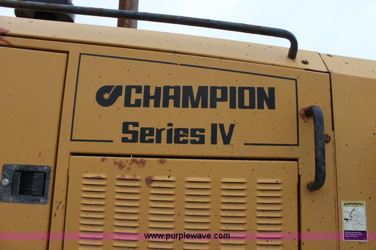 image for item E4315 Champion 720A Series IV articulated motor grader