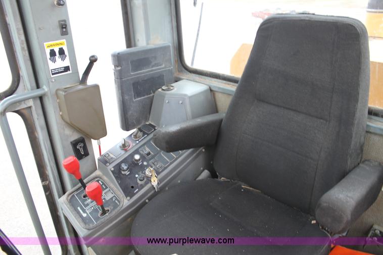 image for item E4315 Champion 720A Series IV articulated motor grader