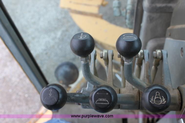 image for item E4315 Champion 720A Series IV articulated motor grader