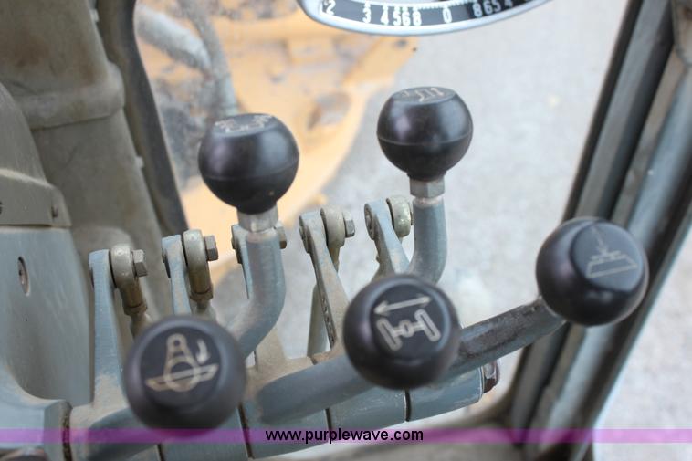 image for item E4315 Champion 720A Series IV articulated motor grader