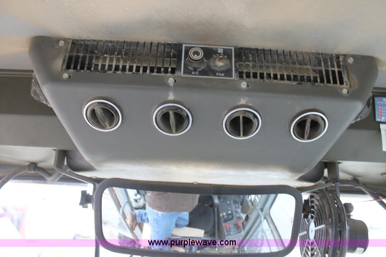 image for item E4315 Champion 720A Series IV articulated motor grader