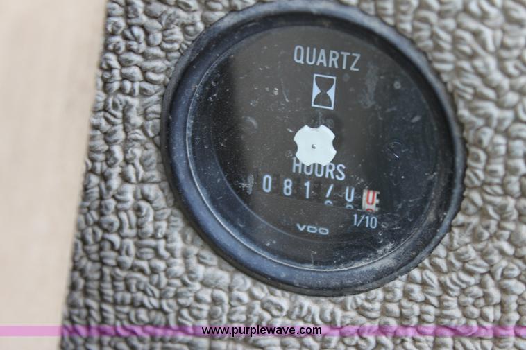 image for item E4315 Champion 720A Series IV articulated motor grader