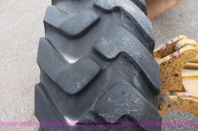 image for item E4315 Champion 720A Series IV articulated motor grader