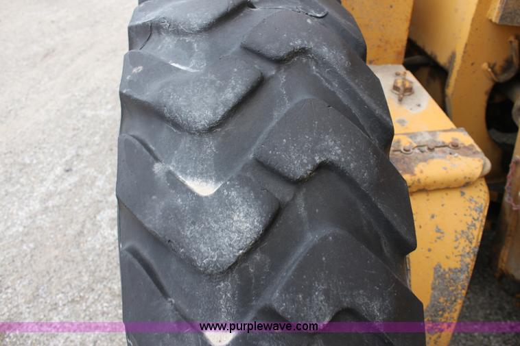 image for item E4315 Champion 720A Series IV articulated motor grader