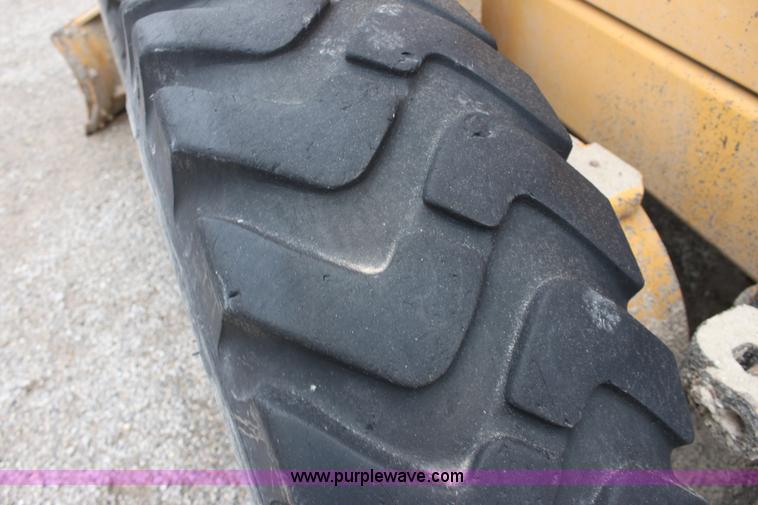 image for item E4315 Champion 720A Series IV articulated motor grader