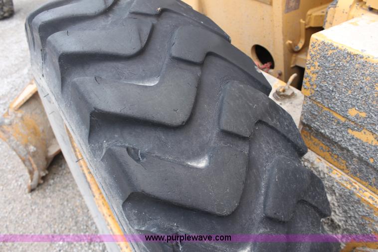 image for item E4315 Champion 720A Series IV articulated motor grader