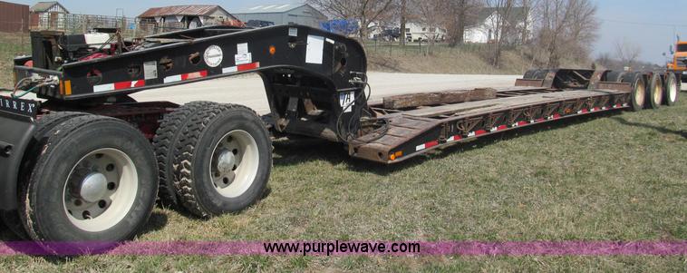 image for item E5968 1998 Fontaine 55 ton triple axel detach lowboy trailer
