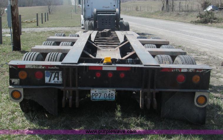 image for item E5968 1998 Fontaine 55 ton triple axel detach lowboy trailer