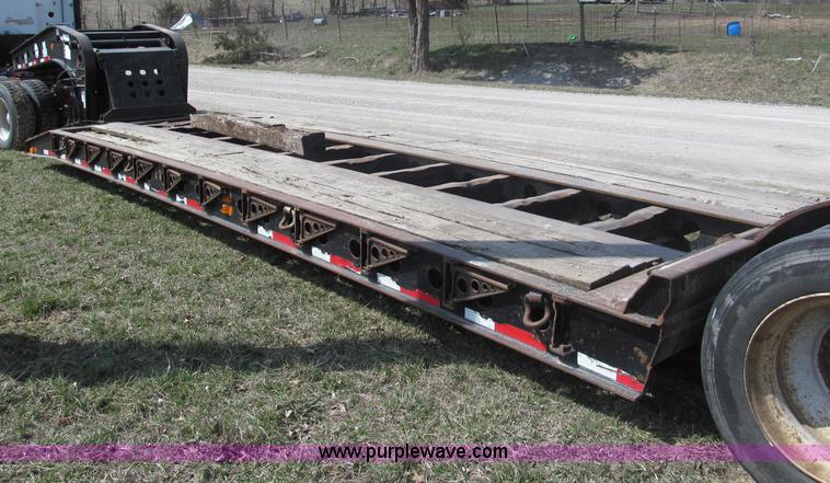 image for item E5968 1998 Fontaine 55 ton triple axel detach lowboy trailer
