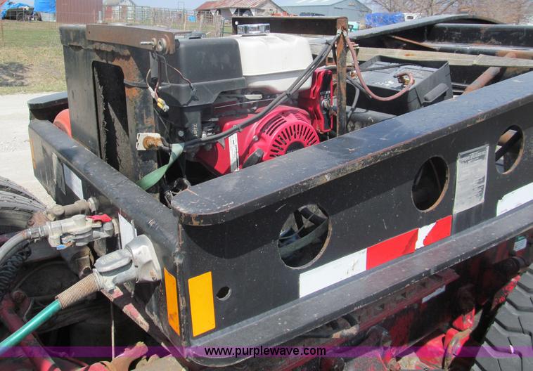 image for item E5968 1998 Fontaine 55 ton triple axel detach lowboy trailer