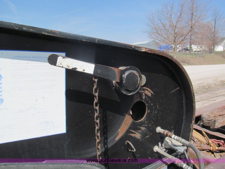 image for item E5968 1998 Fontaine 55 ton triple axel detach lowboy trailer