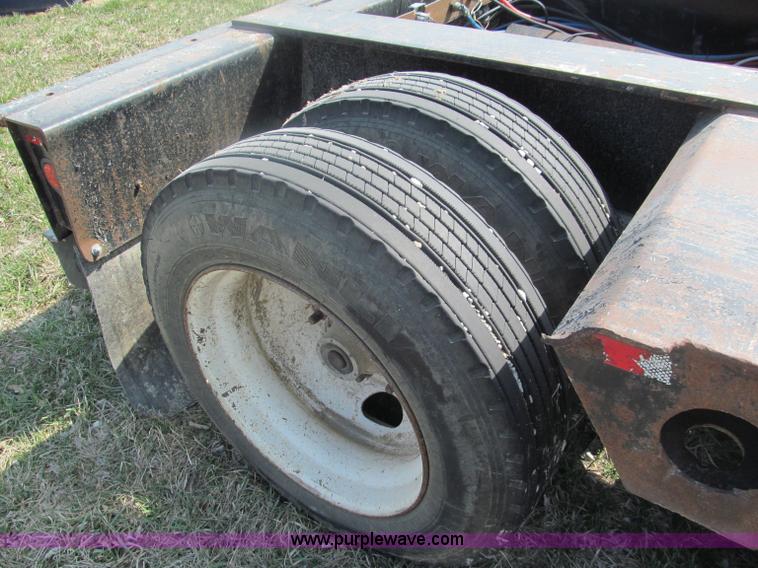 image for item E5968 1998 Fontaine 55 ton triple axel detach lowboy trailer