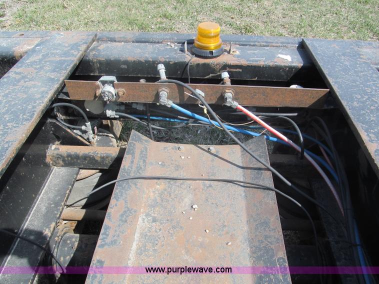 image for item E5968 1998 Fontaine 55 ton triple axel detach lowboy trailer