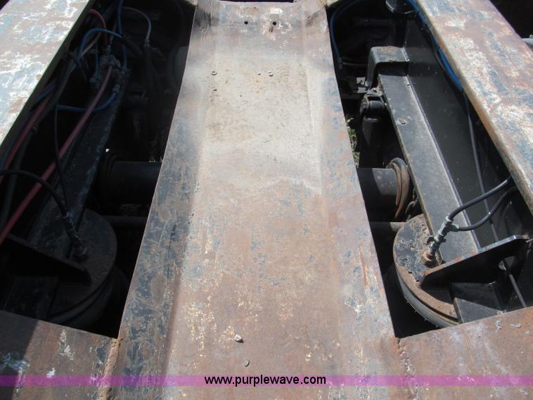 image for item E5968 1998 Fontaine 55 ton triple axel detach lowboy trailer
