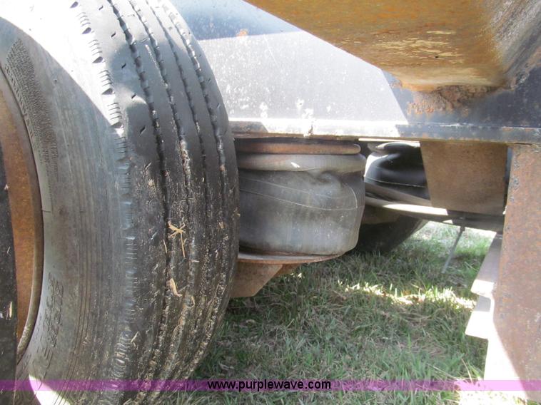 image for item E5968 1998 Fontaine 55 ton triple axel detach lowboy trailer