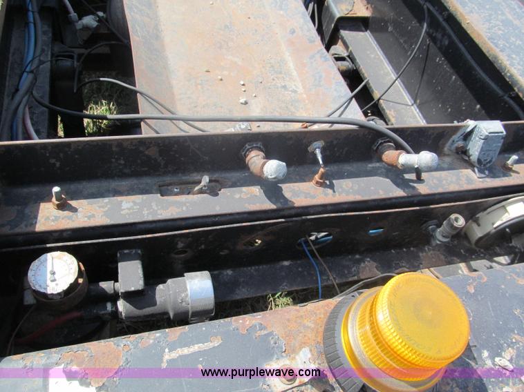 image for item E5968 1998 Fontaine 55 ton triple axel detach lowboy trailer