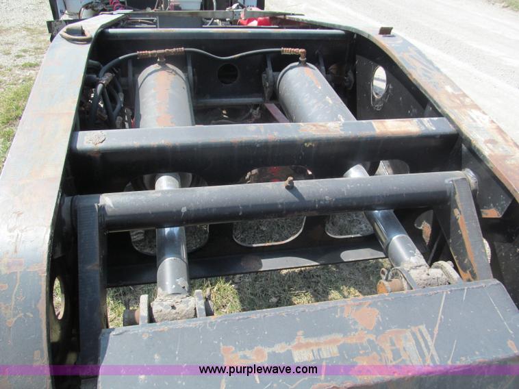 image for item E5968 1998 Fontaine 55 ton triple axel detach lowboy trailer
