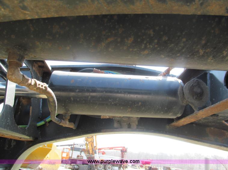 image for item E5968 1998 Fontaine 55 ton triple axel detach lowboy trailer