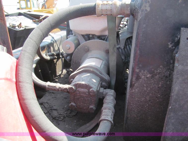 image for item E5968 1998 Fontaine 55 ton triple axel detach lowboy trailer