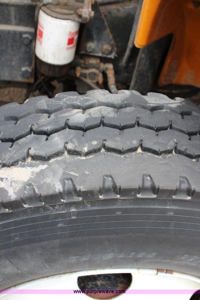 image for item G5358 2001 Freightliner FL70 dump truck