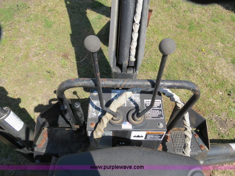 image for item S9579 Bradco 11HD skid steer mounted backhoe attachment