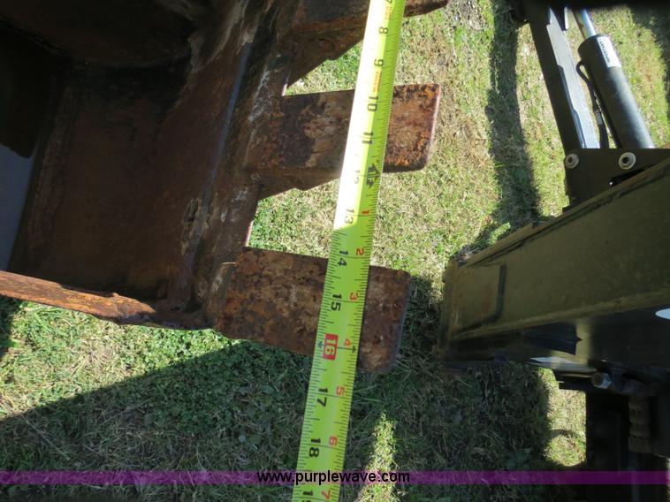 image for item S9579 Bradco 11HD skid steer mounted backhoe attachment