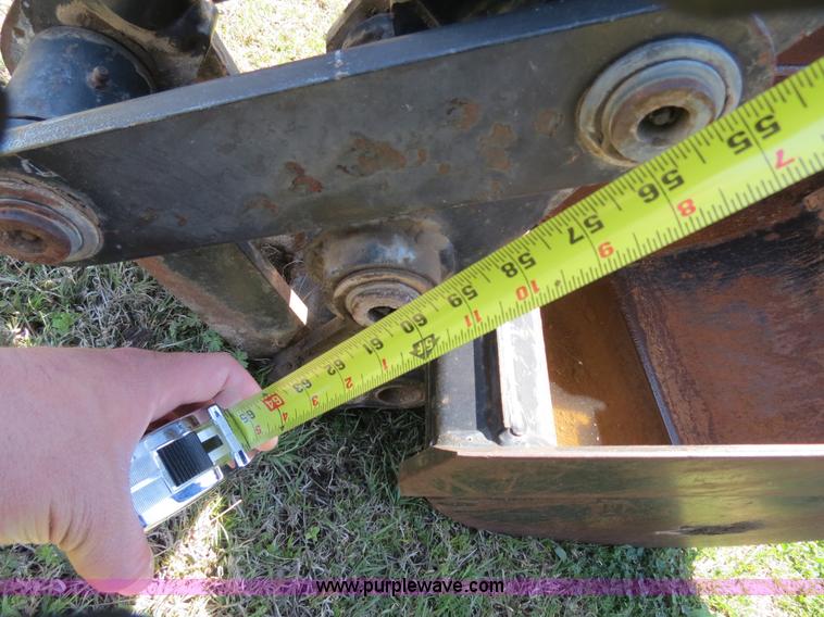 image for item S9579 Bradco 11HD skid steer mounted backhoe attachment