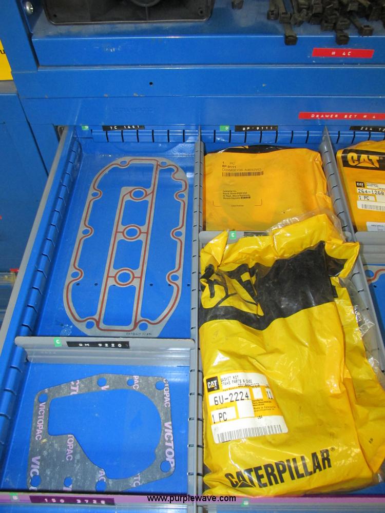 image for item V9962 Equipto parts bin and assorted Caterpillar parts