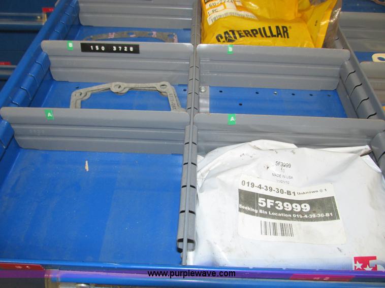 image for item V9962 Equipto parts bin and assorted Caterpillar parts