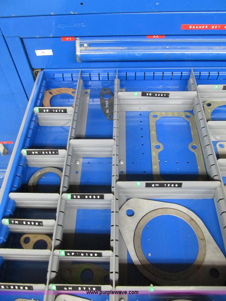 image for item V9962 Equipto parts bin and assorted Caterpillar parts