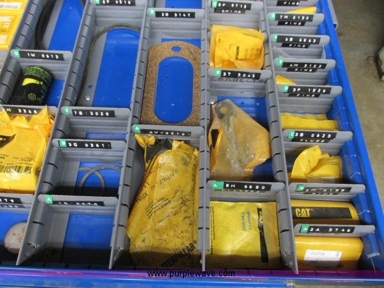 image for item V9962 Equipto parts bin and assorted Caterpillar parts