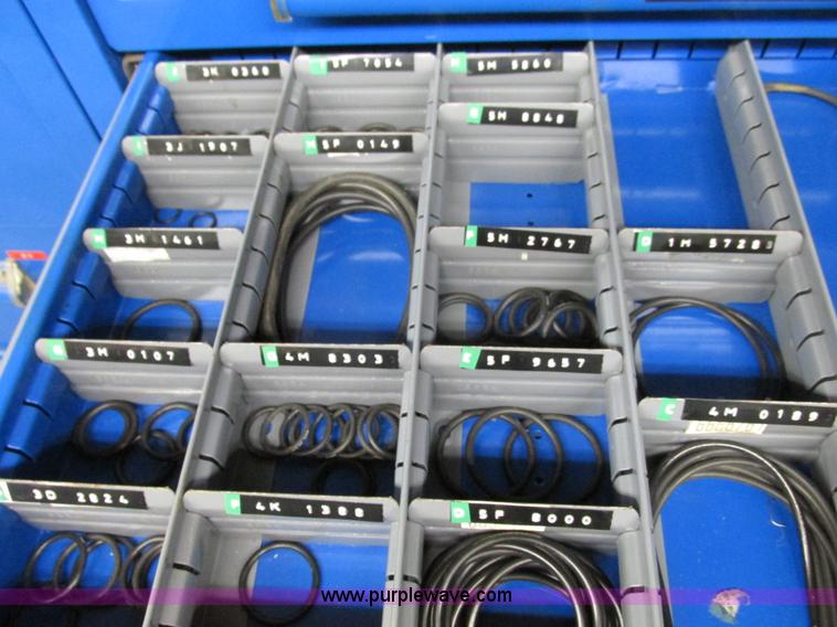 image for item V9962 Equipto parts bin and assorted Caterpillar parts