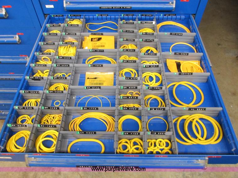 image for item V9962 Equipto parts bin and assorted Caterpillar parts