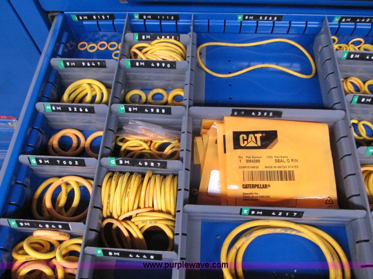 image for item V9962 Equipto parts bin and assorted Caterpillar parts