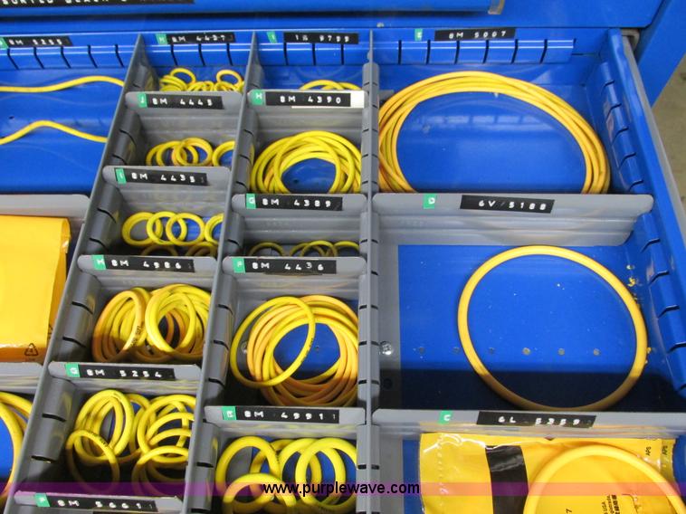 image for item V9962 Equipto parts bin and assorted Caterpillar parts