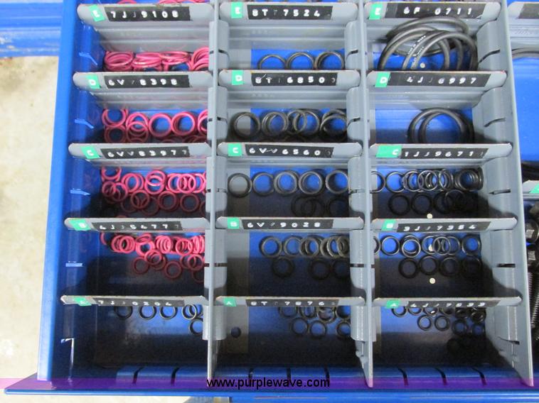 image for item V9962 Equipto parts bin and assorted Caterpillar parts